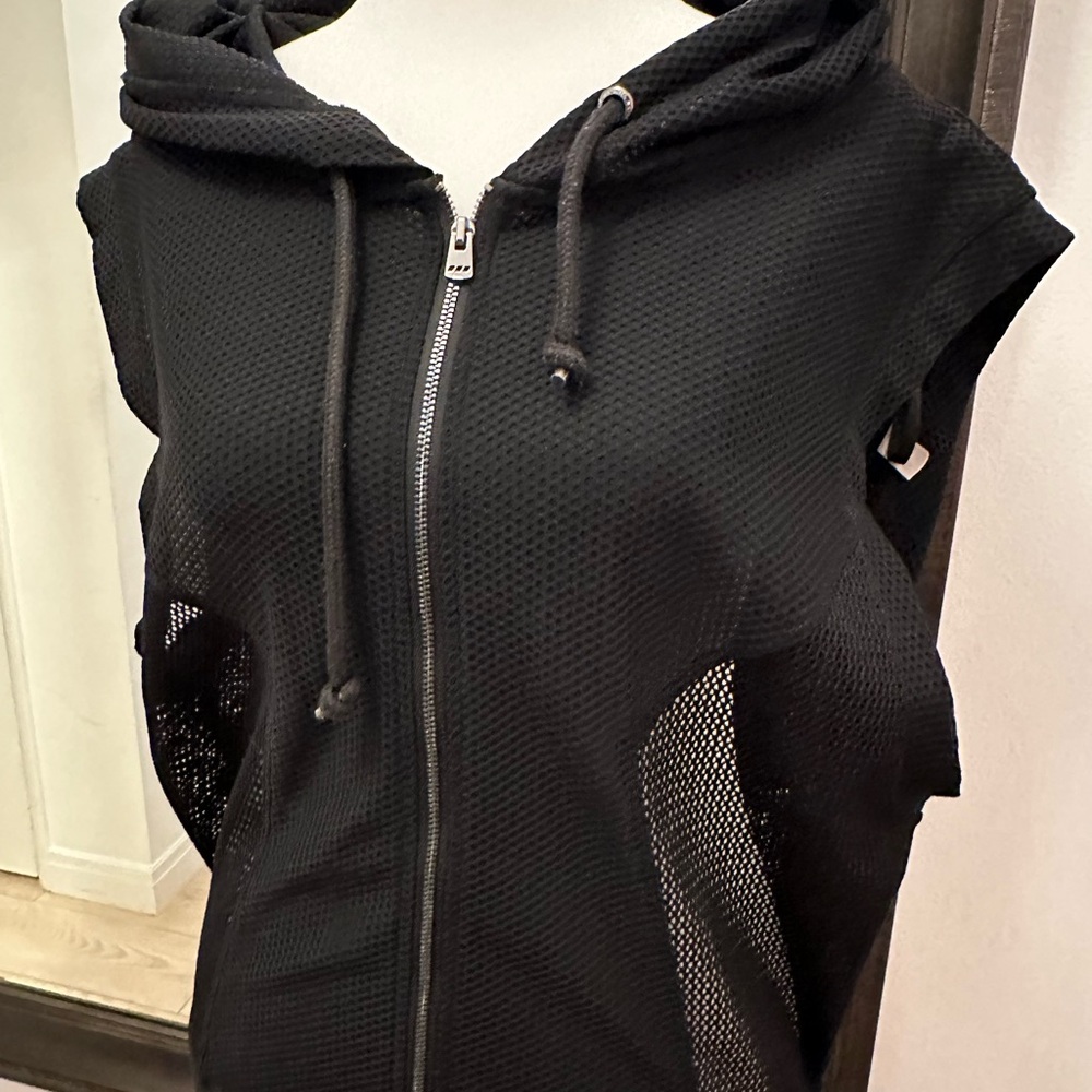 LornaJane sz small athletic vest. Stretchy. Black w stretch and sits below waist